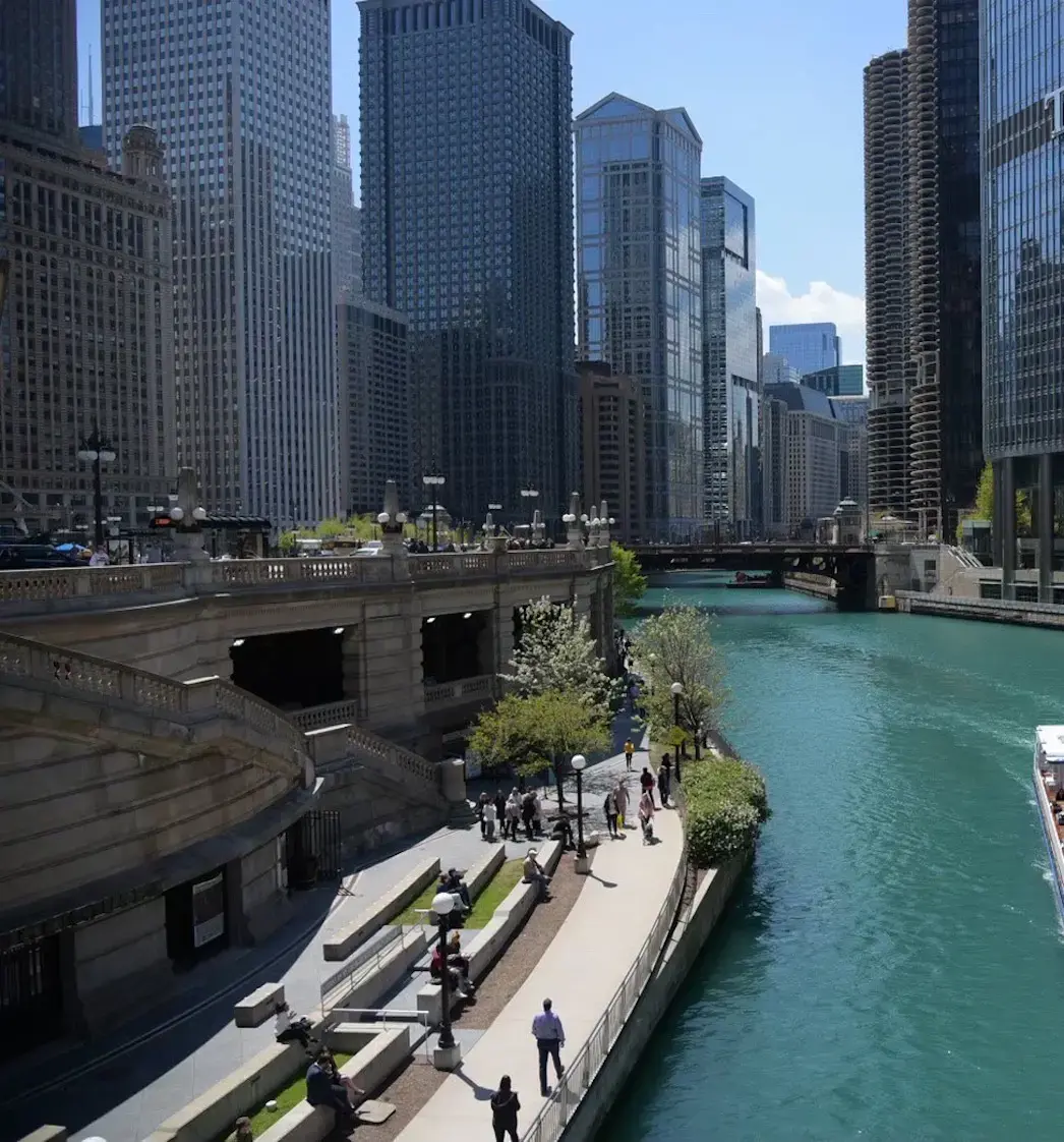River flowing through downtown between skyscrapers